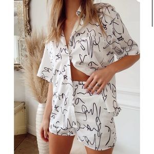 La clasica boyfriend button up shirt! 12th tribe